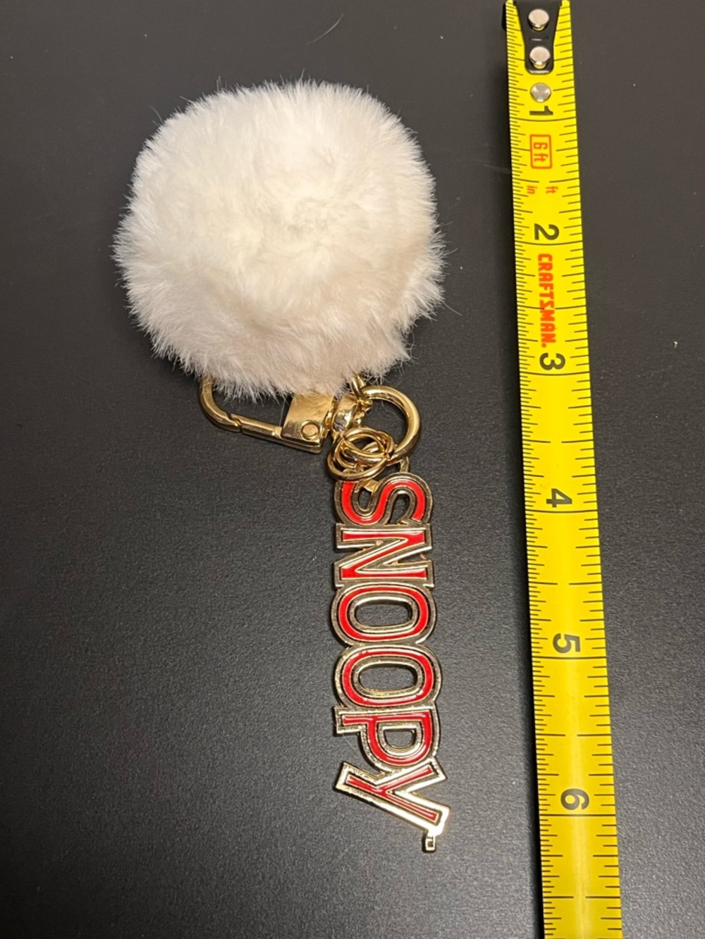 Snoopy gold 'Hoover' Keychain with White Faux Fur Pom